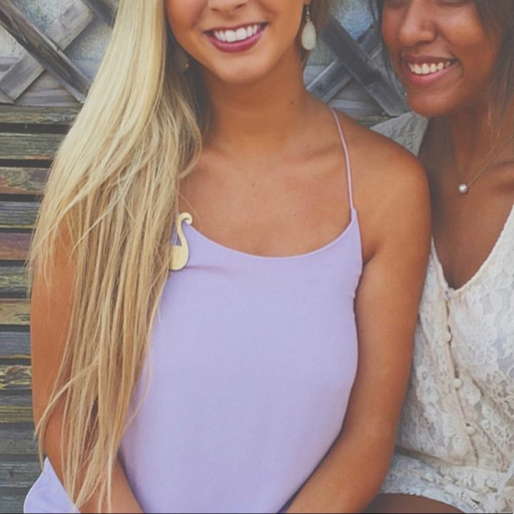 Light purple shift dress. Hits about mid thigh